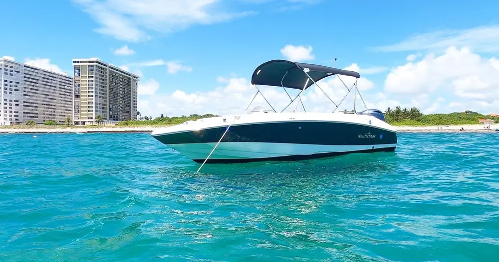 Fort Lauderdale boat rental with captain guiding group on water